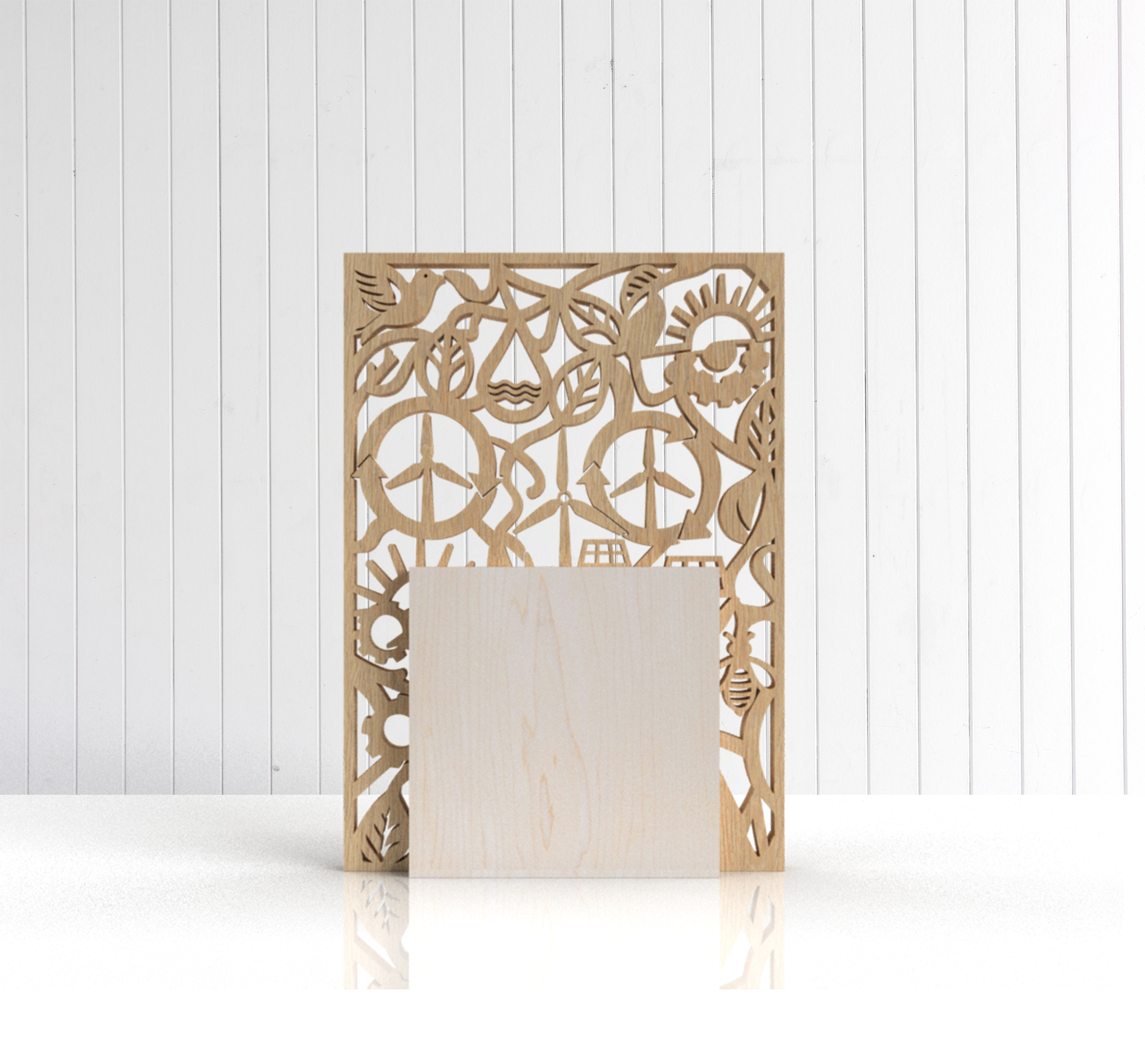 Eco cutout wooden trophy back showing laser-cut renewable energy themed centre panel and ash blocks
