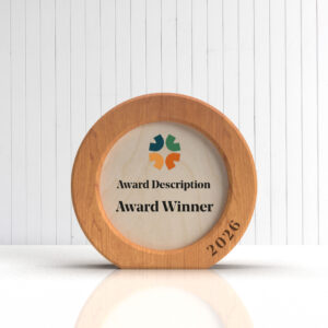 Round layered oak and birch trophy with full-colour logo and winner text in the centre and engraved year on the outer ring